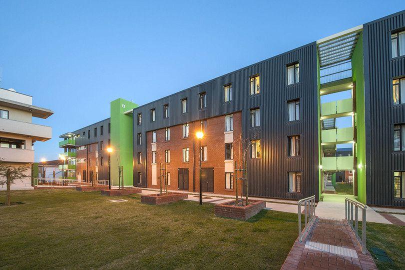 Modern accommodation building at dusk