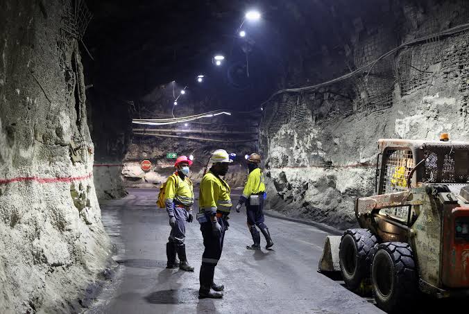 Mining team working underground